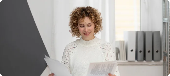 Professional translator reviewing certified documents
